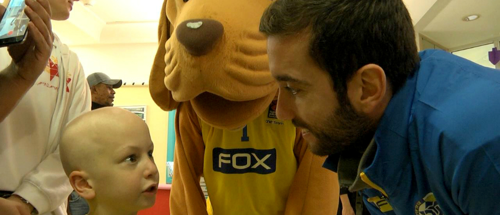 Watch: Maccabi players visiting children at the hospital